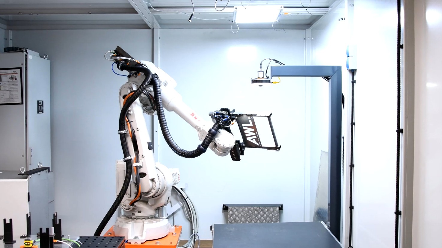 IUNA AI Weld Seam Inspection - Automotive seating structure with handling robot